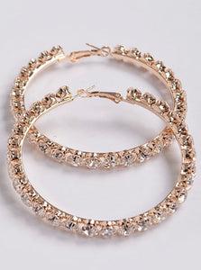 Gold hoop earrings with stone accents